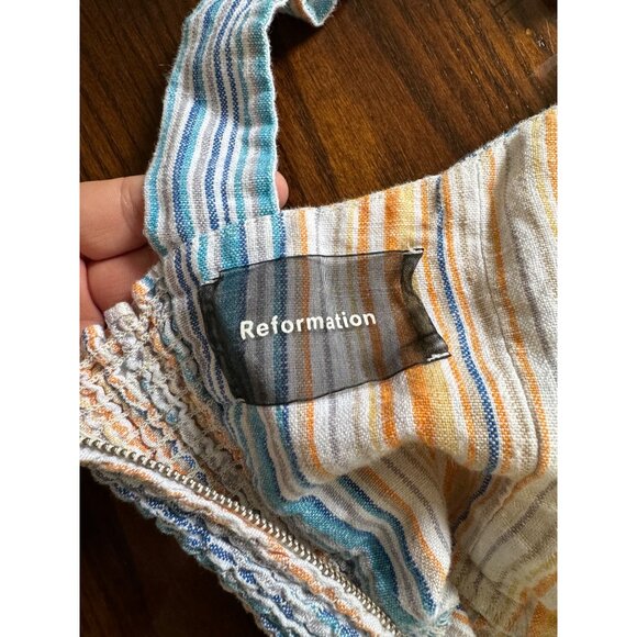 Reformation Island Linen Romper in Marbella Striped White Blue Orange Smocking 2 - Picture 4 of 10